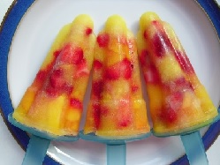 Three yellow Hide and Seek Ice Lollies on a plate